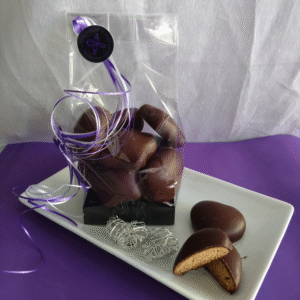 Kleine Lebkuchen mit dunkler Couverture ummantelt